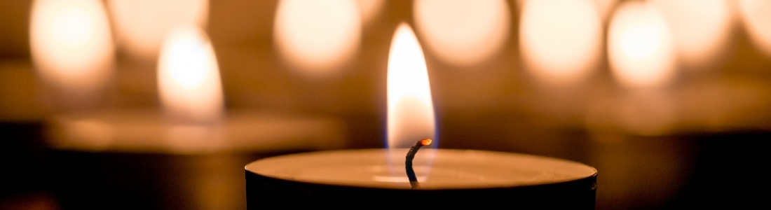 Close up of candles alight