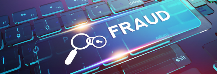 The word fraud on a keyboard