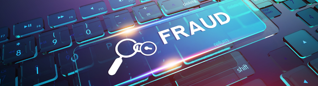The word fraud on a keyboard