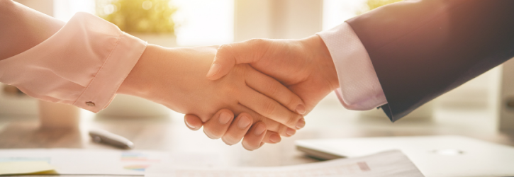 Handshake on meeting conveyancing solicitor