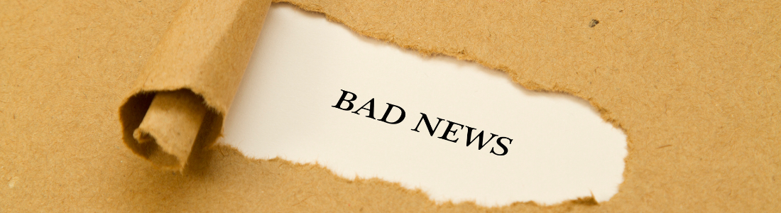 Envelope ripped to reveal Bad News