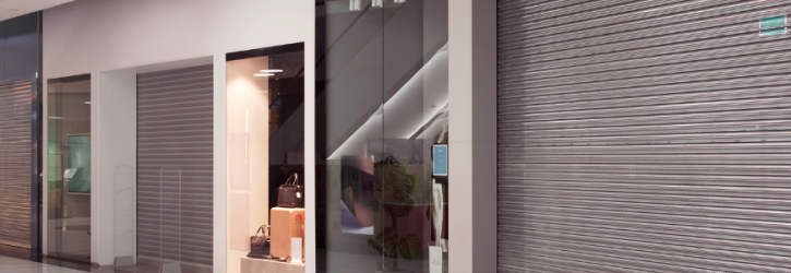 Shuttered shops in shopping centre