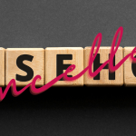 Leasehold spelled with wooden blocks with the word cancelled overlaying the blocks representing leasehold reform
