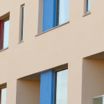 Apartments with red and blue windows