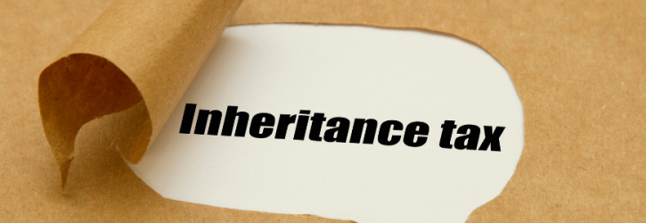 Torn envelope revealing words Inheritance Tax