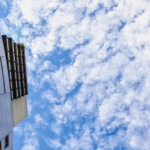 Looking up at two tower blocks