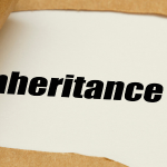 Ripped envelope revealing the words Inheritance Tax