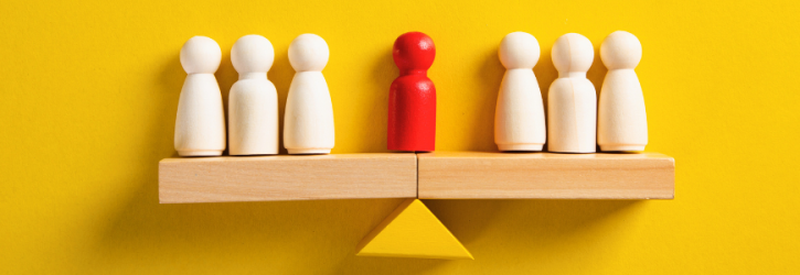 Figures on a scale representing breach of fiduciary duty