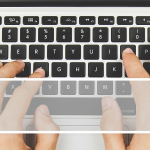 Person on keyboard using AI to update wills