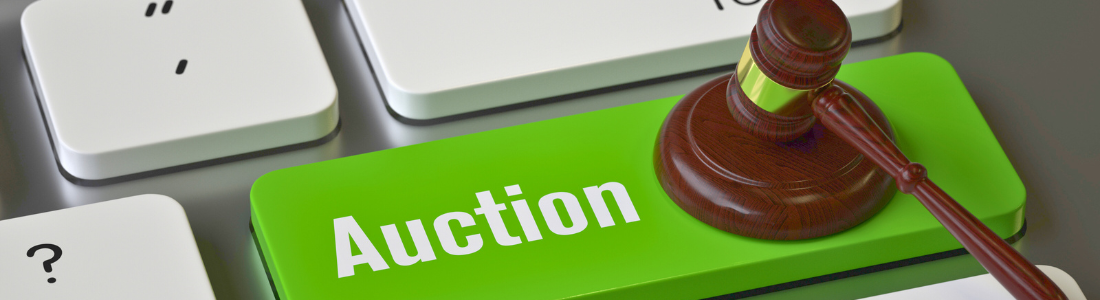 Keyboard and gavel representing the modern method of auction