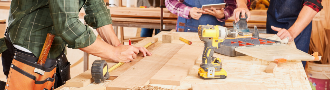 Cabinet makers using a checklist for starting a small business