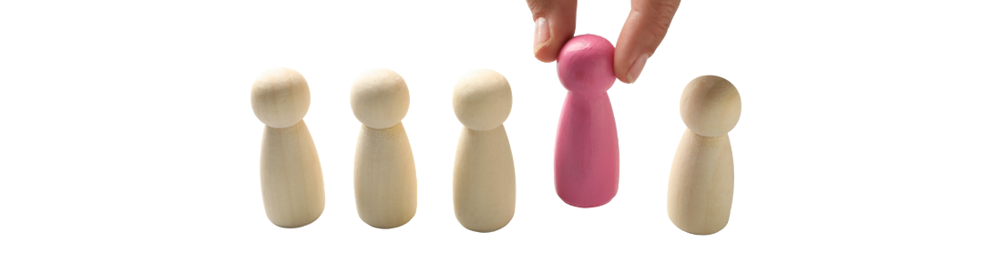 Red peg selected from others representing unfair dismissal